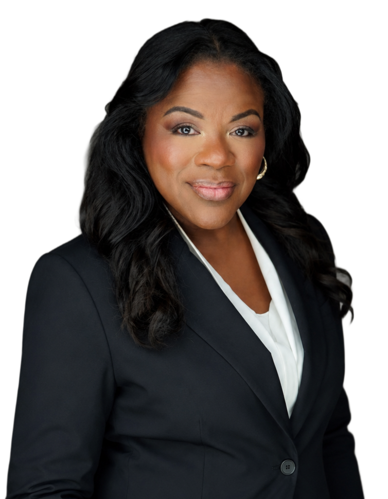 Professional headshot of a woman in a black blazer and white blouse, smiling against a plain background
