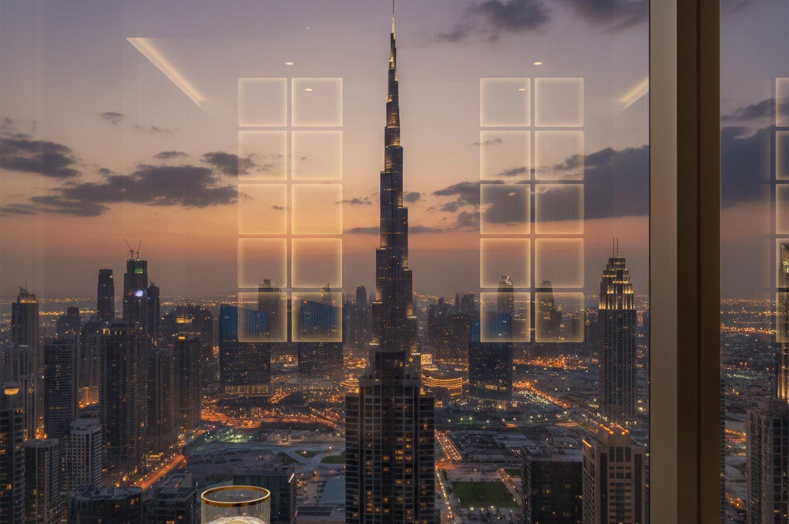 A breathtaking sunset view of the Burj Khalifa and the Dubai city skyline seen through a luxury wind