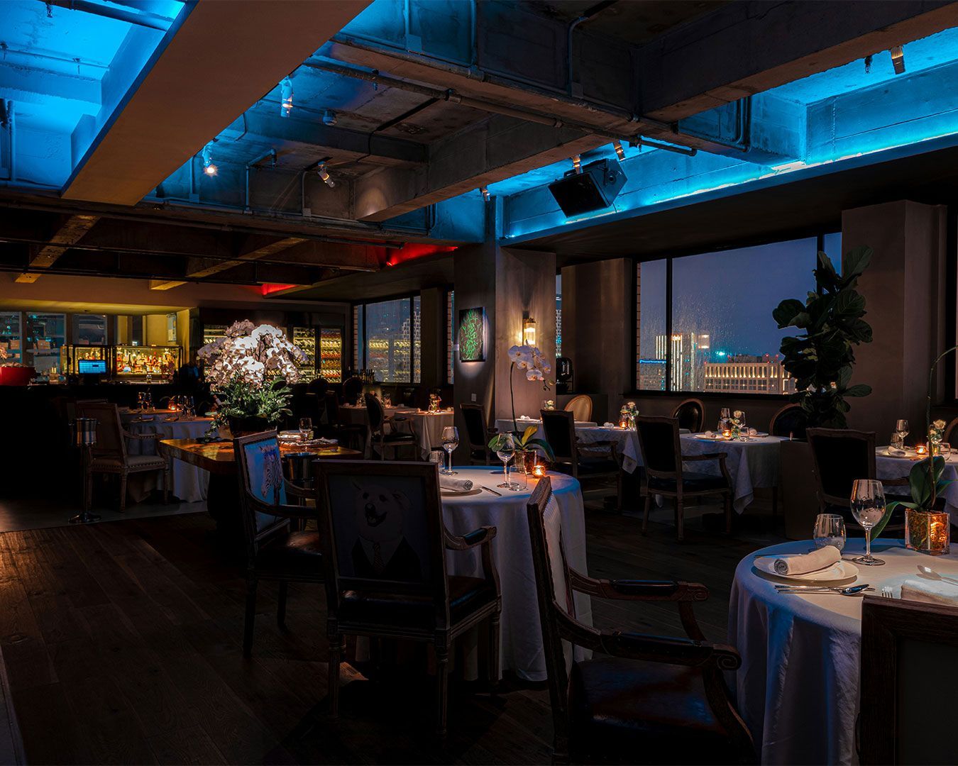 An upscale private dining space in Singapore featuring modern decor, ambient lighting, and a refined, intimate atmosphere for exclusive dining experiences
