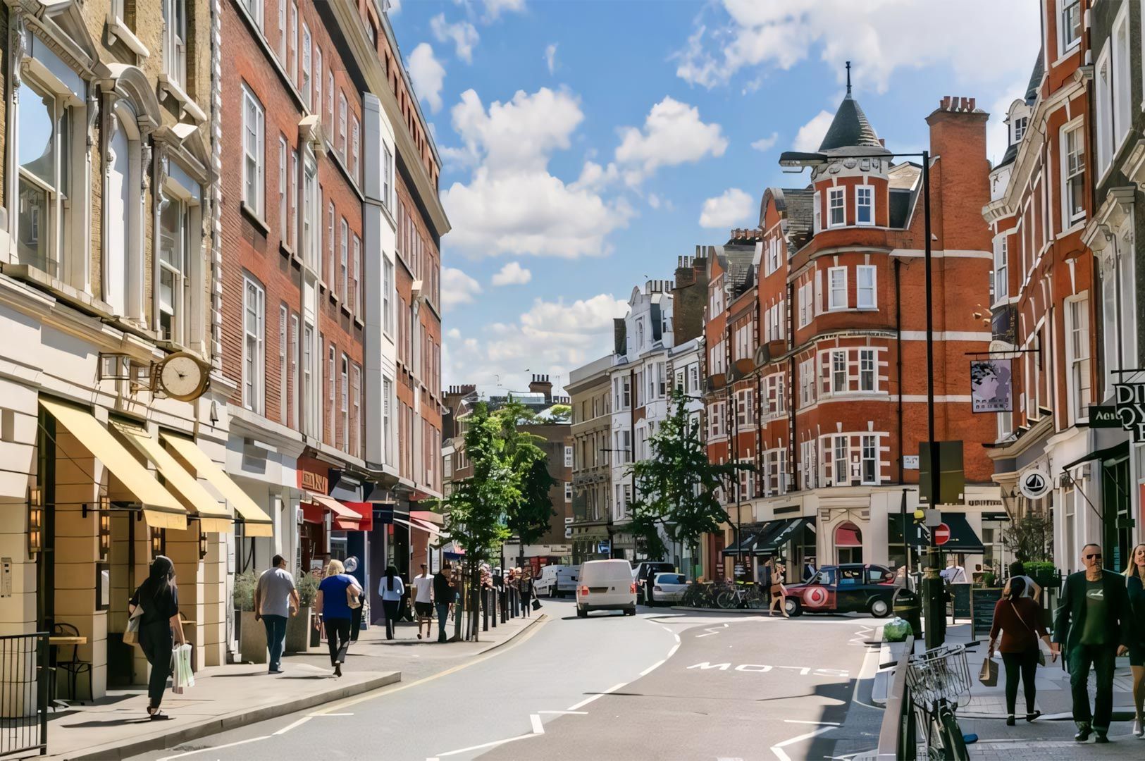 A bustling London street scene featuring red brick buildings, boutique shops with yellow awnings, and a black taxi.