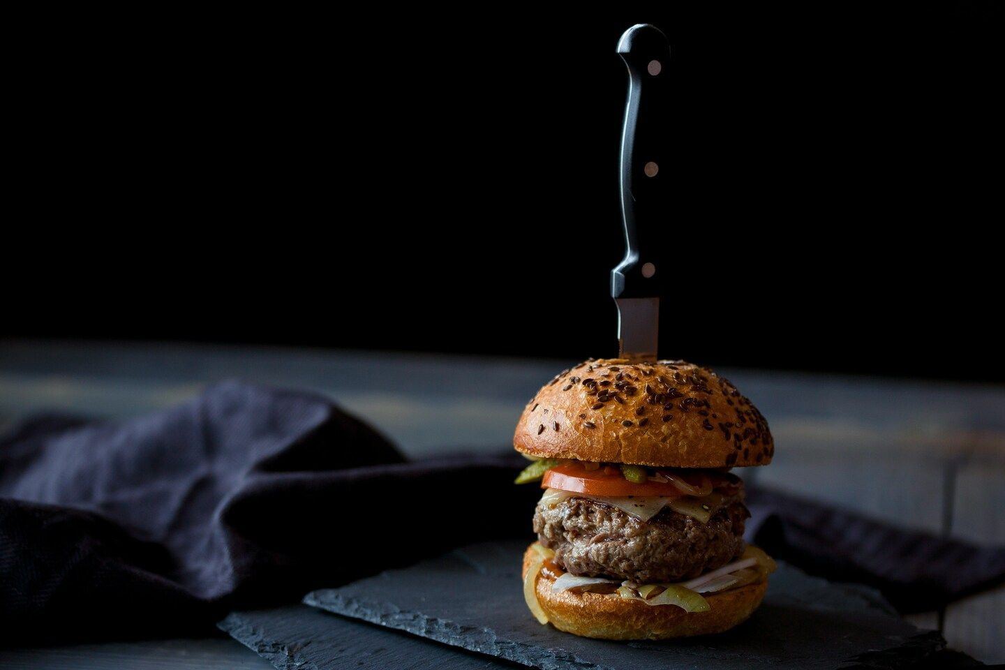 Travelling Assistant : Artisan burger crafted with premium ingredients and modern flair.