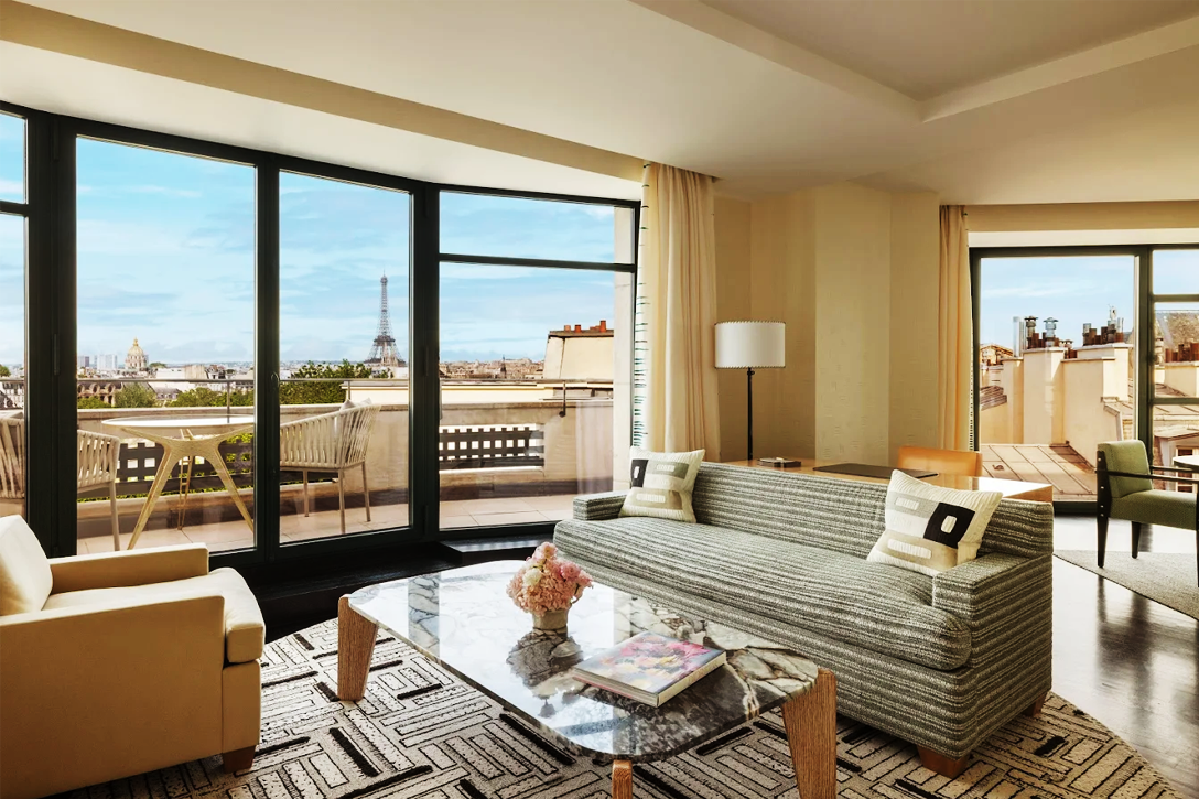 5 Ultra-Luxury Hotels: Elegant suite interior at Cheval Blanc Paris reflecting home-like intimacy in a grand setting.