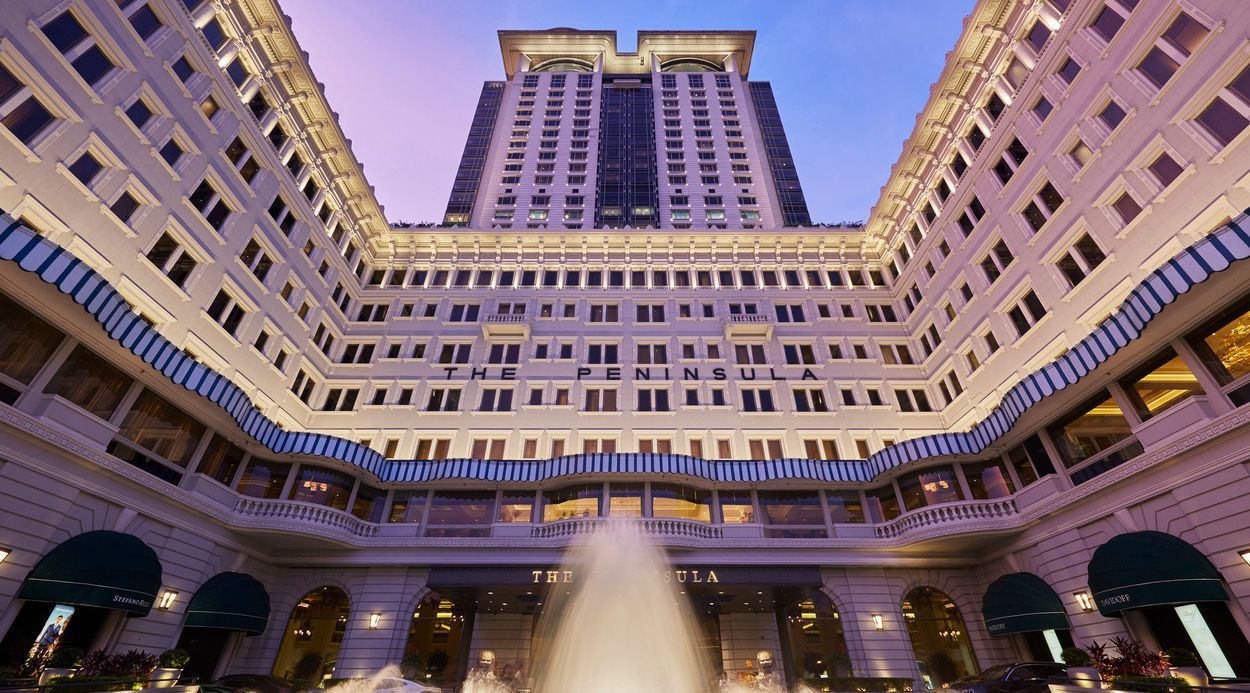 5 Ultra-Luxury Hotels: Grand entrance of The Peninsula Hong Kong welcoming distinguished guests.