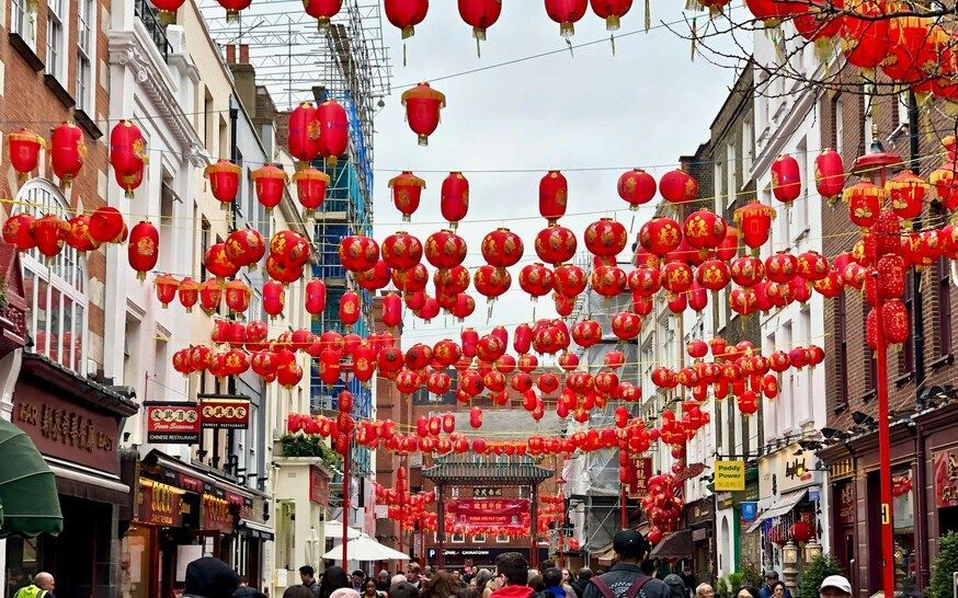 The Assistant's Singapore : Walking through Chinatown’s vibrant streets filled with markets and temples.
