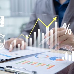 Businessman analyzing profit and quality management concepts long term cost planning, product quality, budgeting, financial forecasting, and company revenue and expense projections