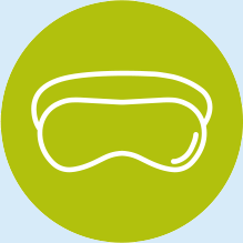 White eye mask icon inside a green circle.