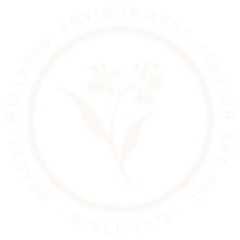 Faint logo of a floral design with text, 