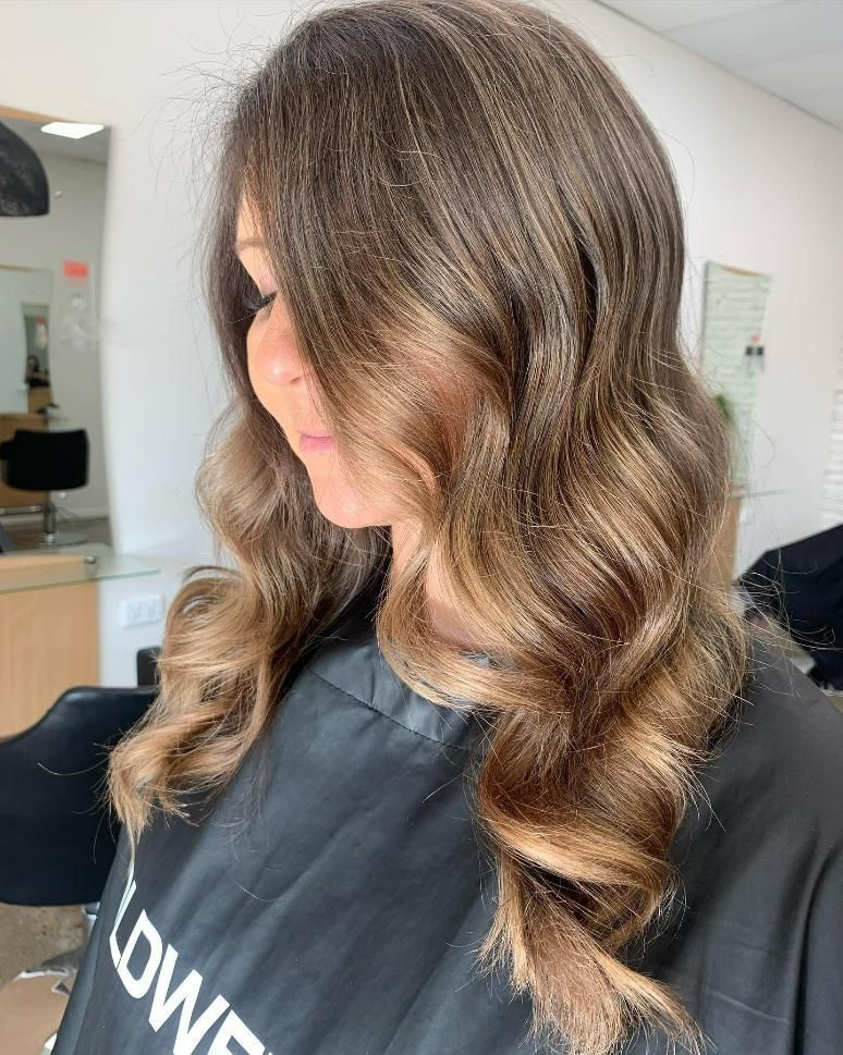 A Woman with Long Brown Hair — Eden Hair in Pacific Paradise, QLD