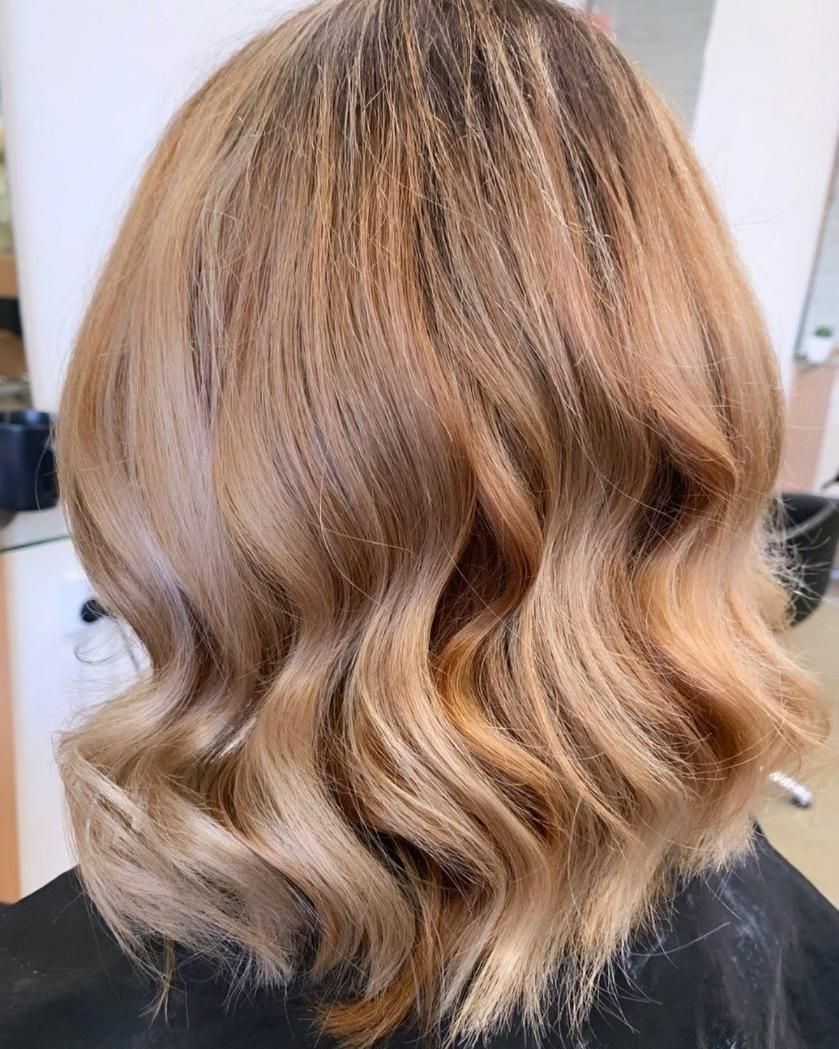 A Woman with Blonde Hair — Eden Hair in Pacific Paradise, QLD
