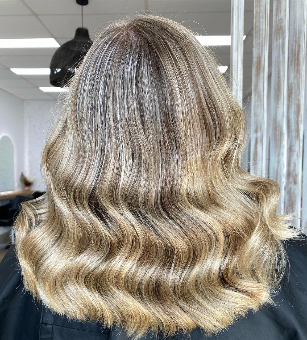 Woman After Being Treated by Hairdresser