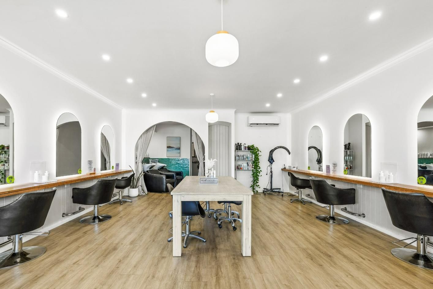 A Woman Is Holding a Bouquet of Flowers — Eden Hair in Pacific Paradise, QLD