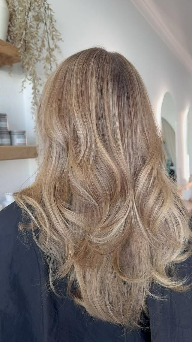 A Woman with Long Blonde Hair — Eden Hair in Pacific Paradise, QLD