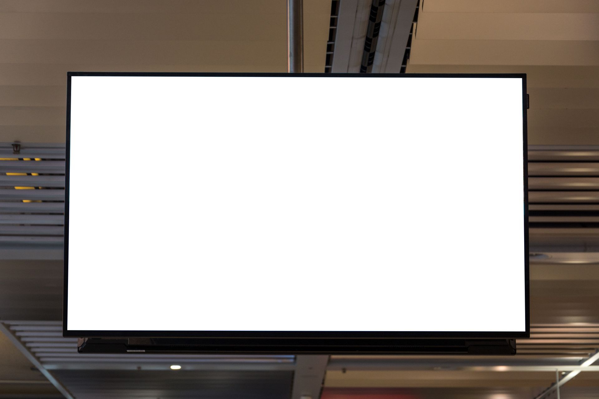 Vertical blank panel showcasing interactive flat panel display in modern corporate boardroom.