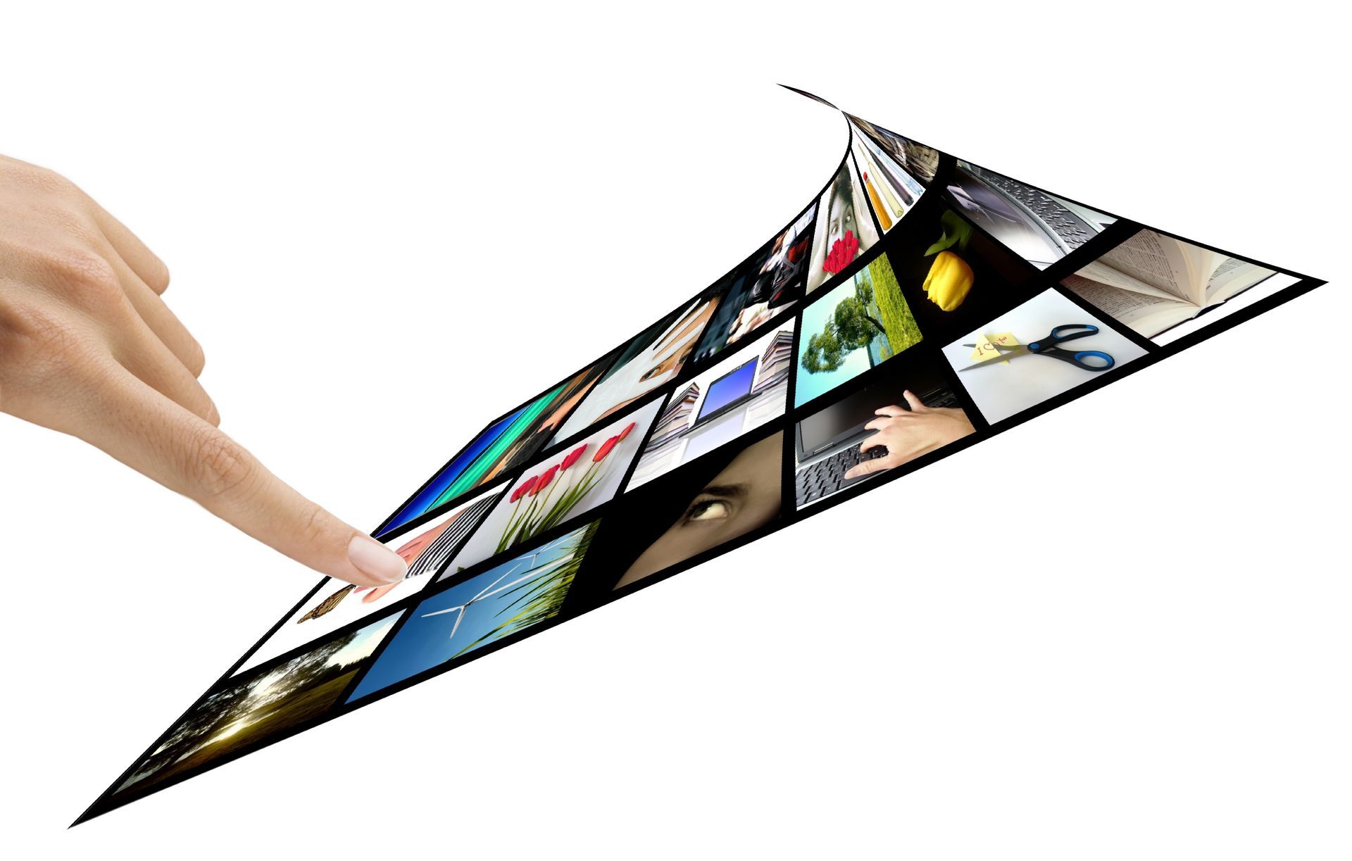 Hand touching a curved grid of digital images on an interactive display Hand touching a curved grid of digital images on an interactive display