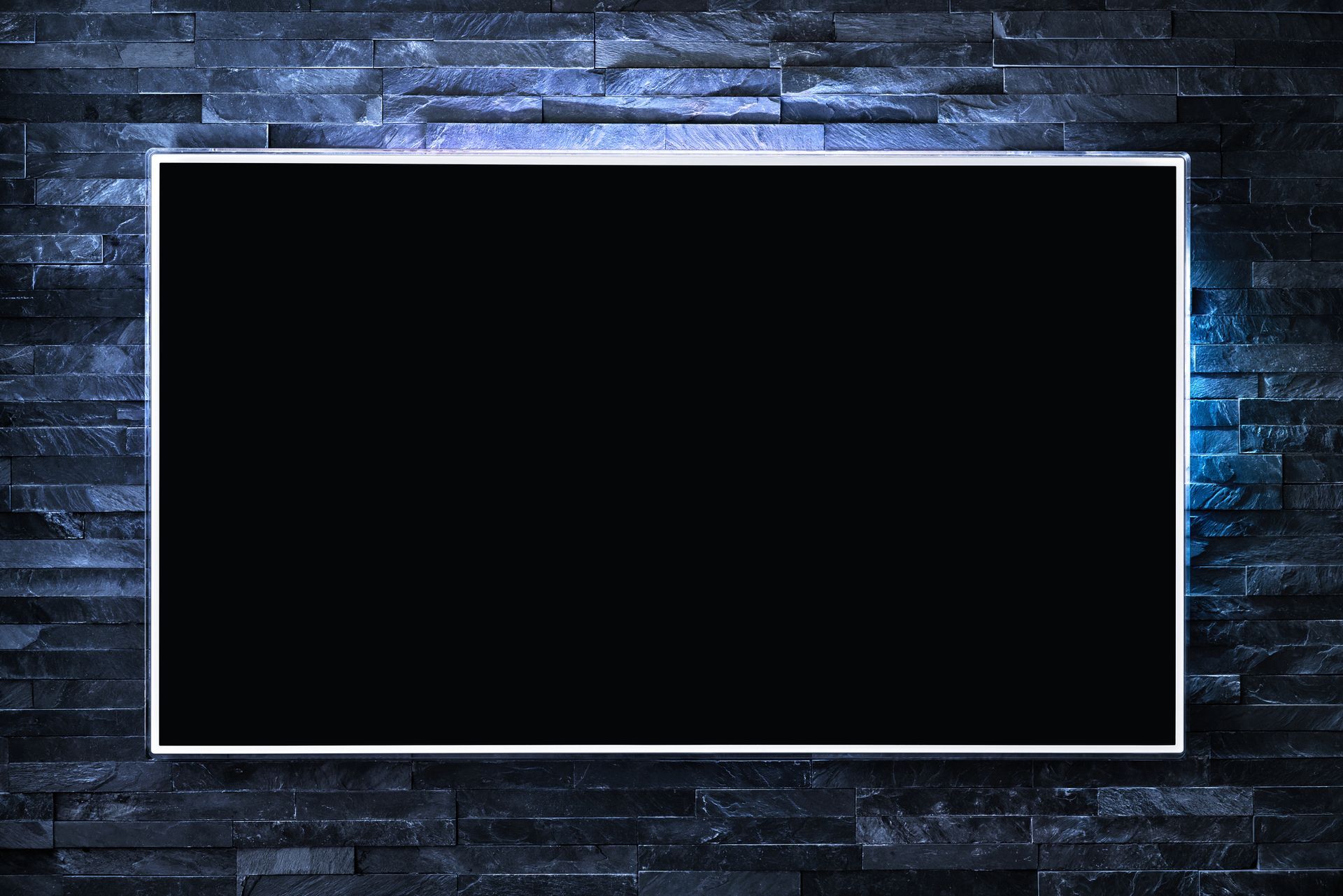 TV screen at night with LED lighting showcasing interactive flat panel display products.