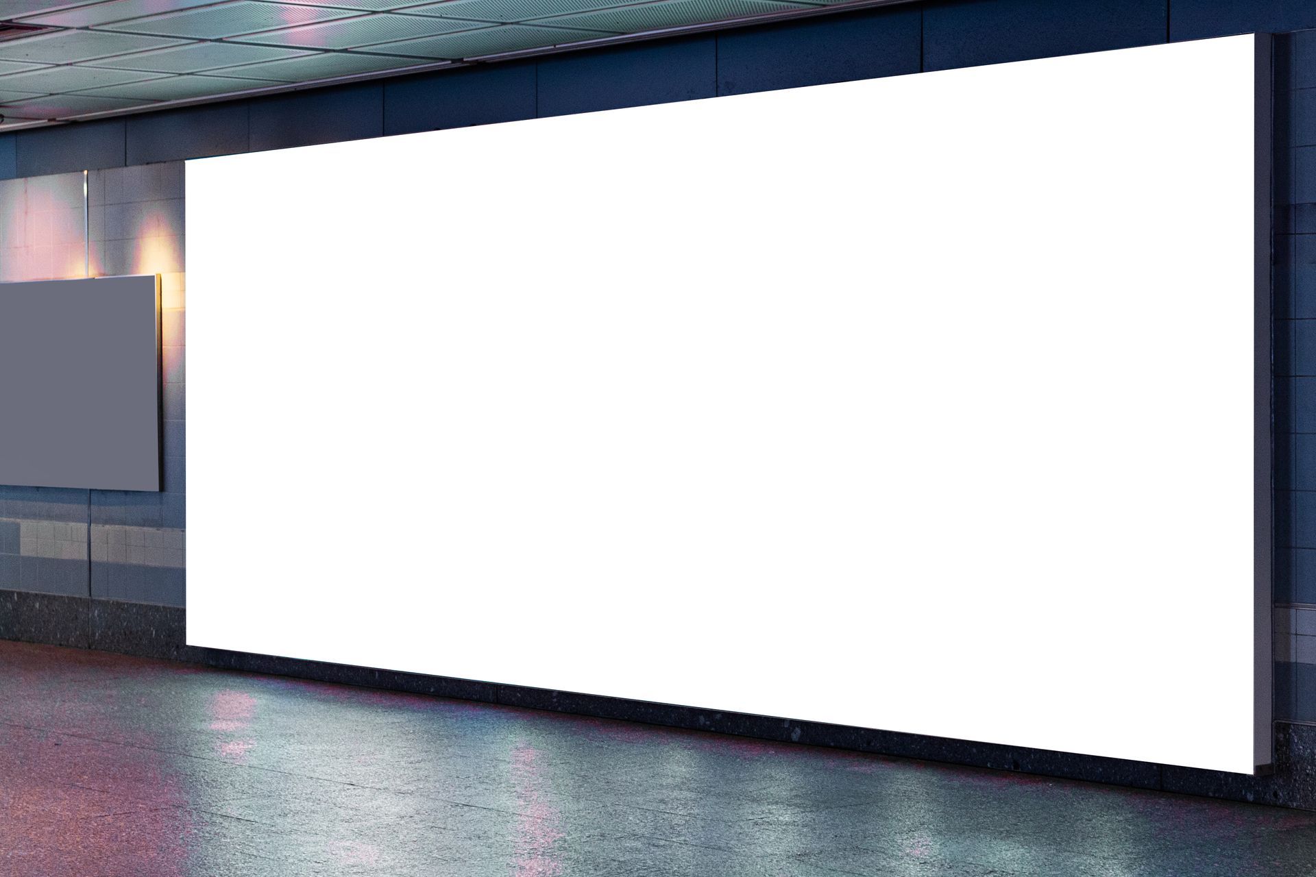 Large blank white billboard in indoor public area.