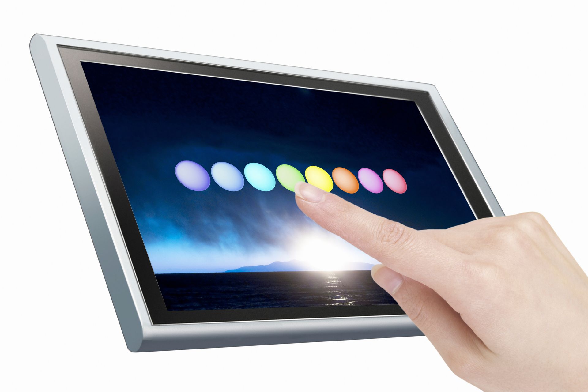 A hand touching a color selection interface on a touchscreen display with vibrant circular icons.