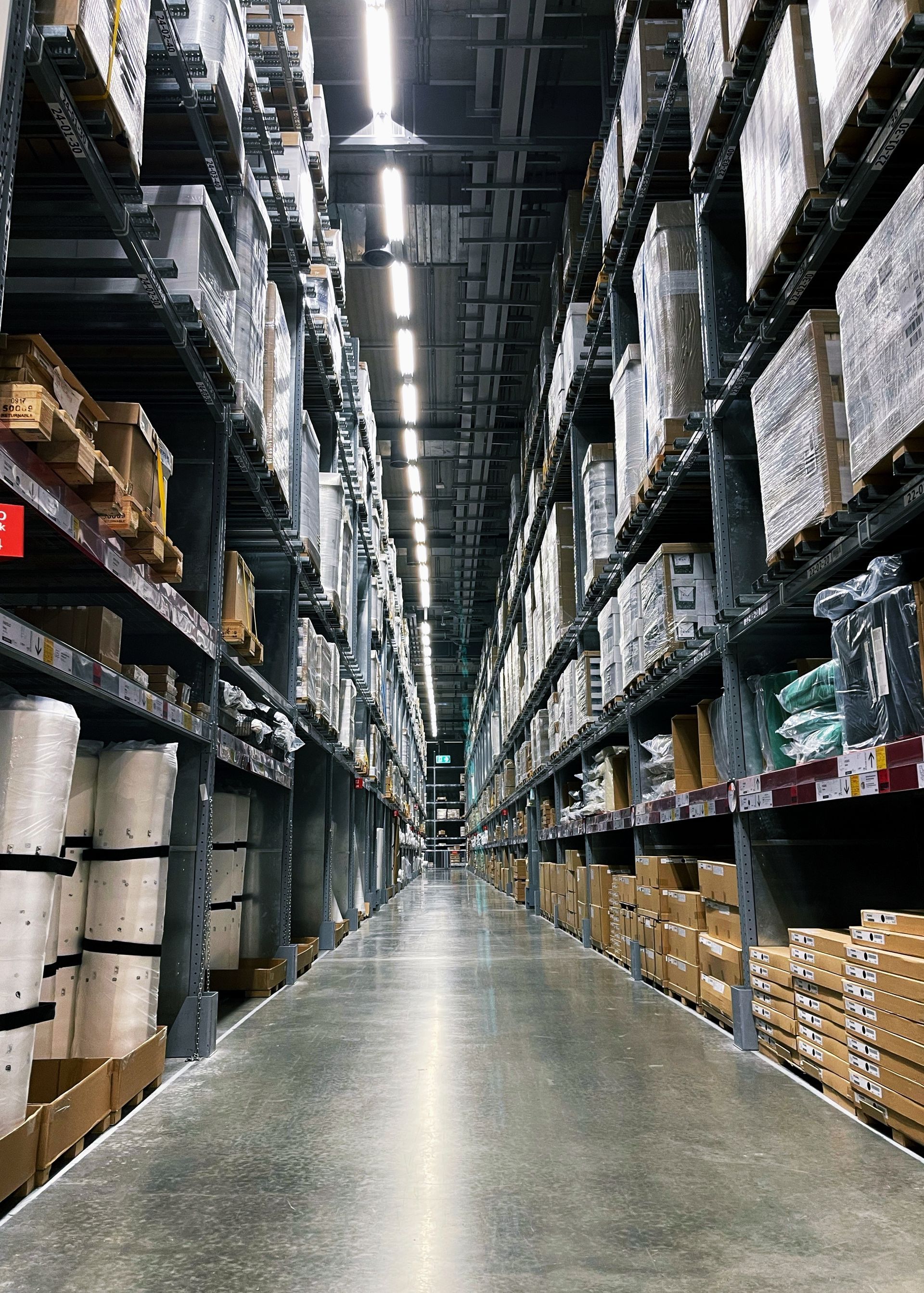 A warehouse filled with lots of shelves and boxes.