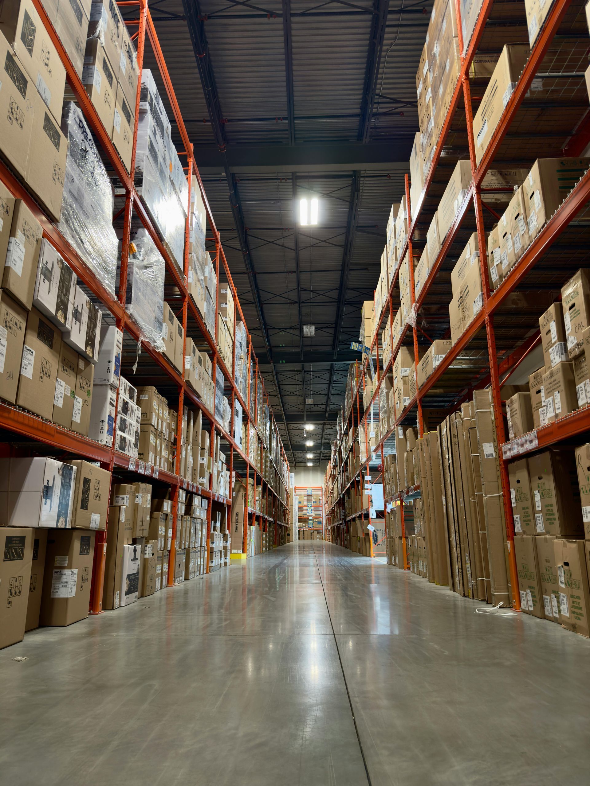 Modern warehouse with organized storage racks for on-demand warehousing solutions