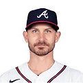 White man in a baseball cap with an