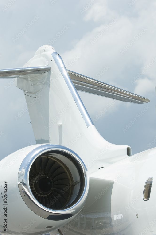 A white airplane with the word jet on the side