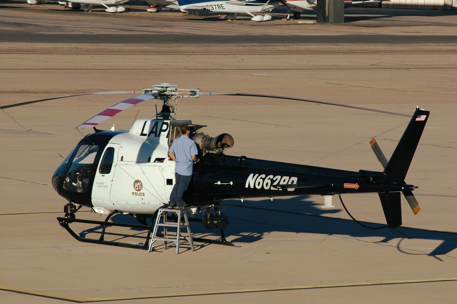 A black and white helicopter with the number n662an on the side