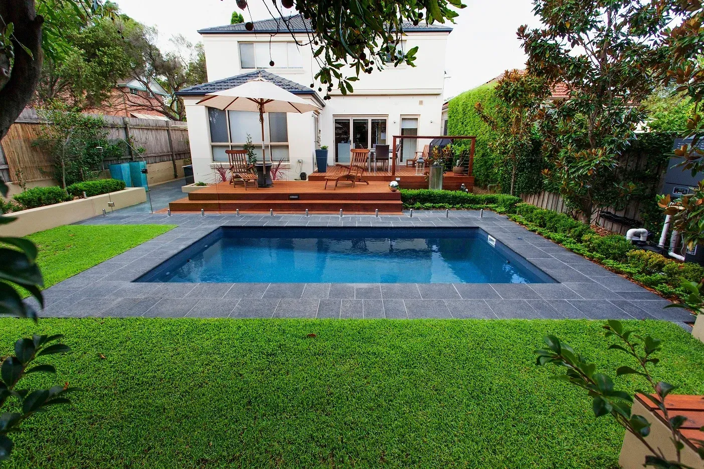 A swimming pool in the backyard of a  Tennessee house