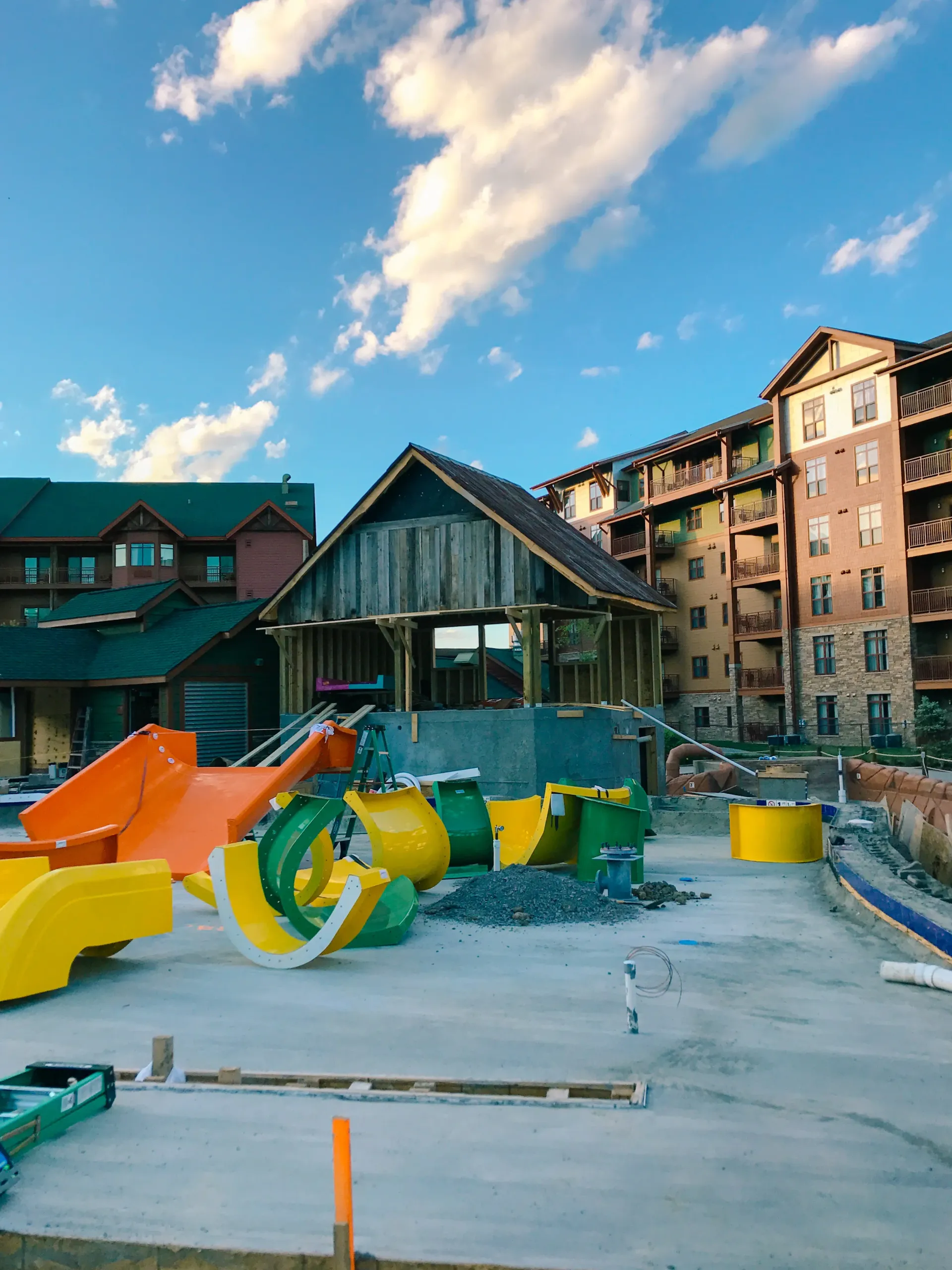 A large building with a playground in front of it