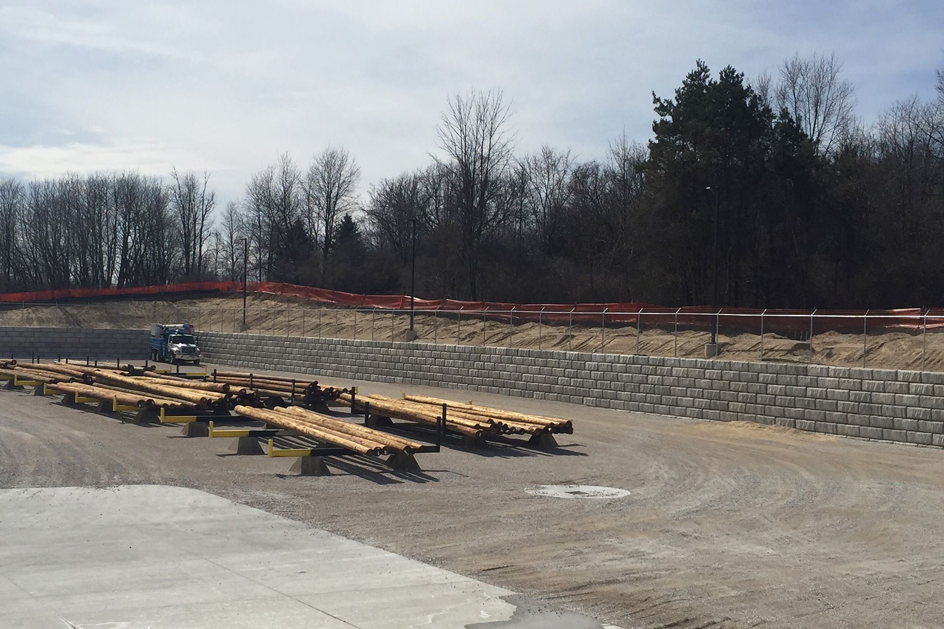 A lot of wooden pallets are sitting on the ground