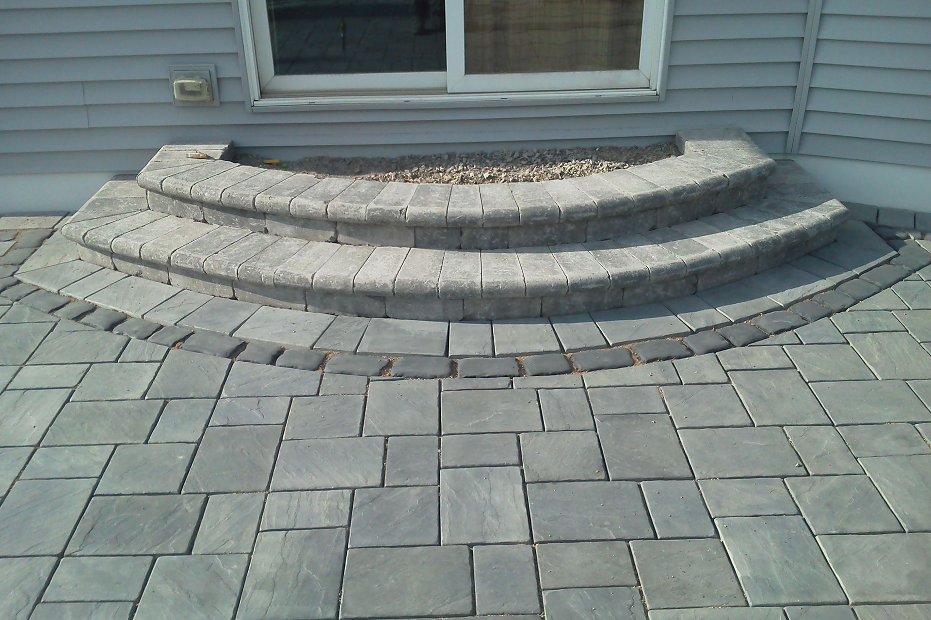 A set of stone steps leading up to a house