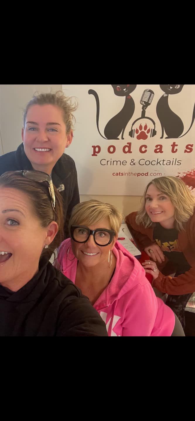 a group of women are posing for a picture in front of a sign that says podcasts .