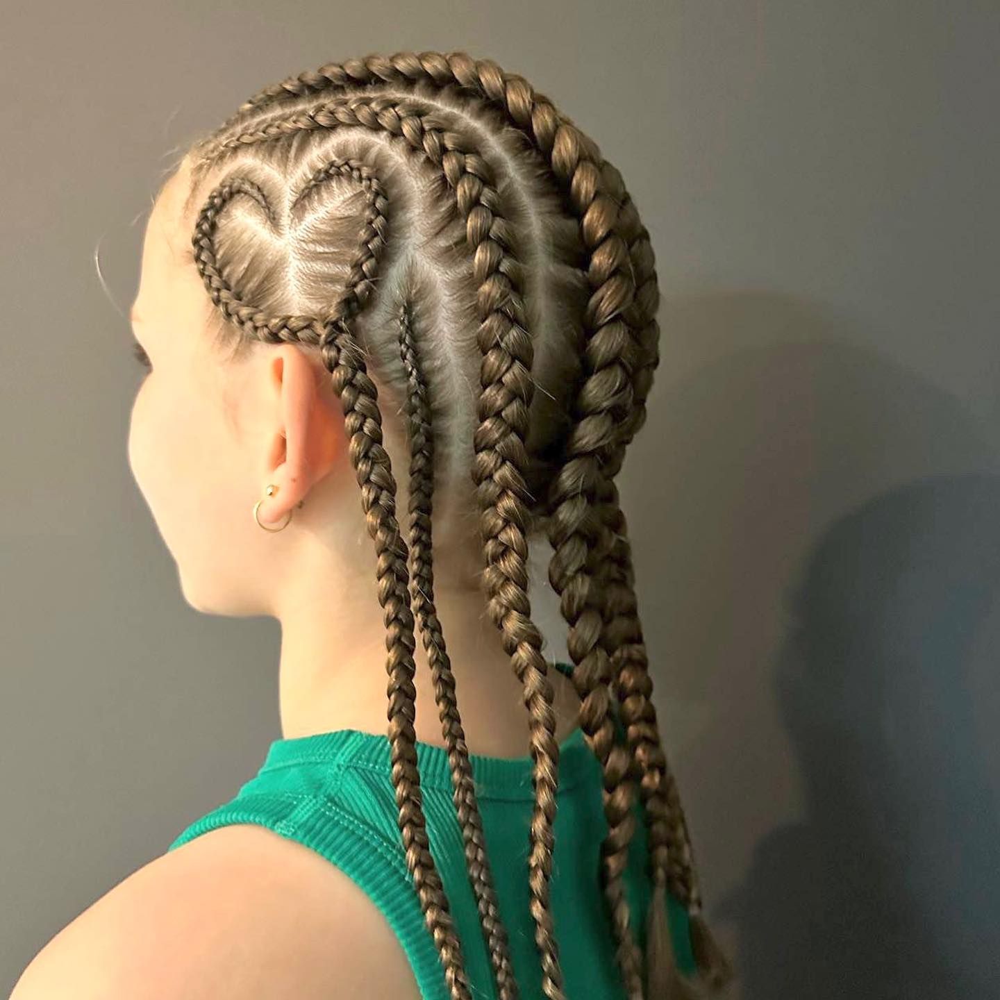 Joyful family Celebrating a Birthday with a cake and Balloons — Party Planner in Tatton NSW