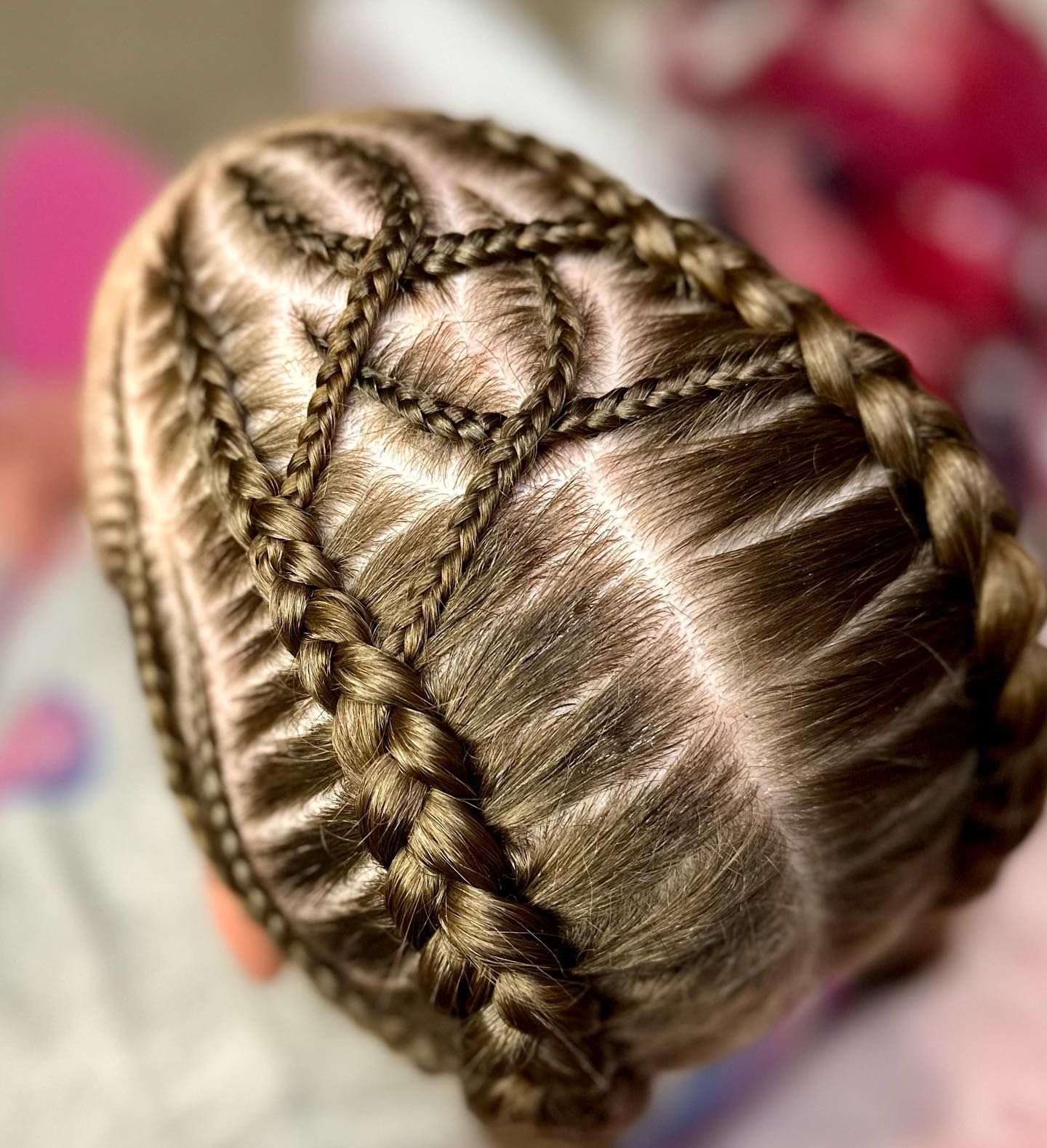 Hairdresser Braiding the hair of a Young girl — Sweet Parties & Braids in Tatton, NSW