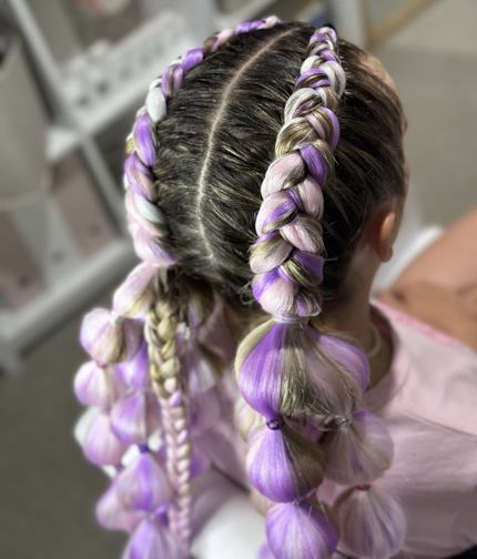 Woman Braiding hair of little Wonderful girl Keeping eyes closed and Smiling Happily — Sweet Parties & Braids in Tatton, NSW