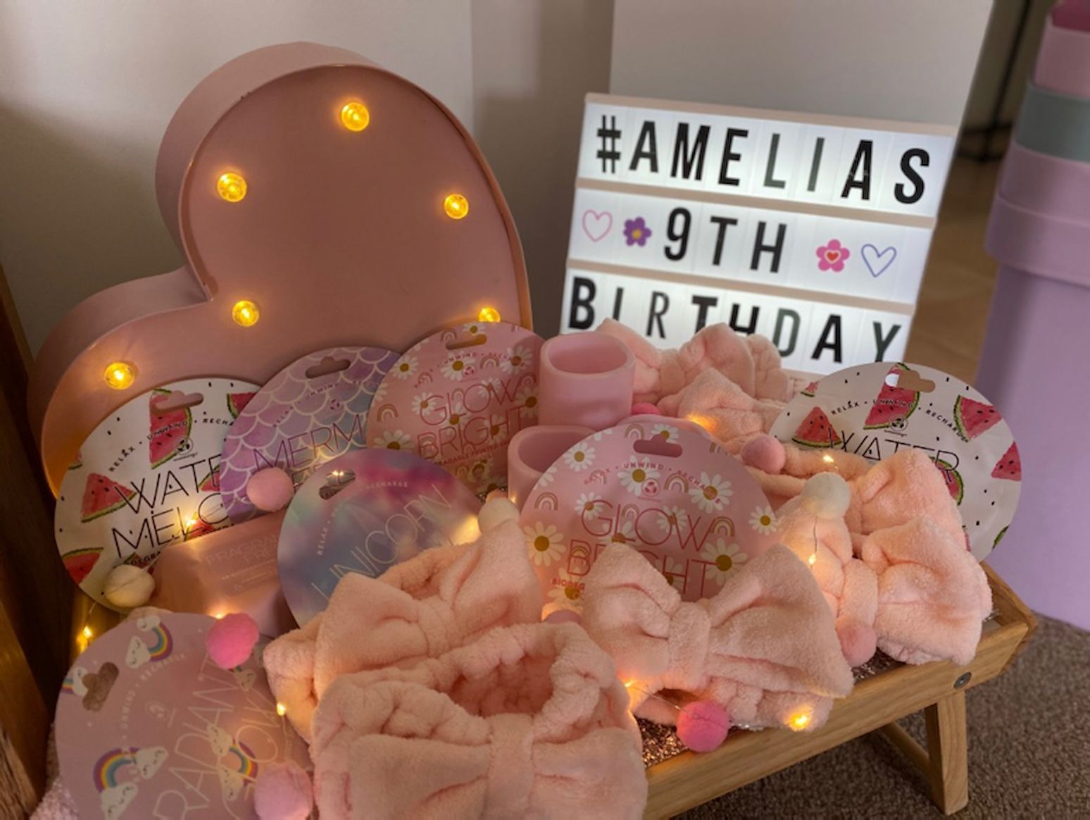 Entertained group of Children Sitting on the floor — Sweet Parties & Braids in Tatton, NSW