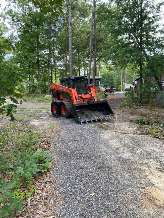 Land clearing using skid steer loader