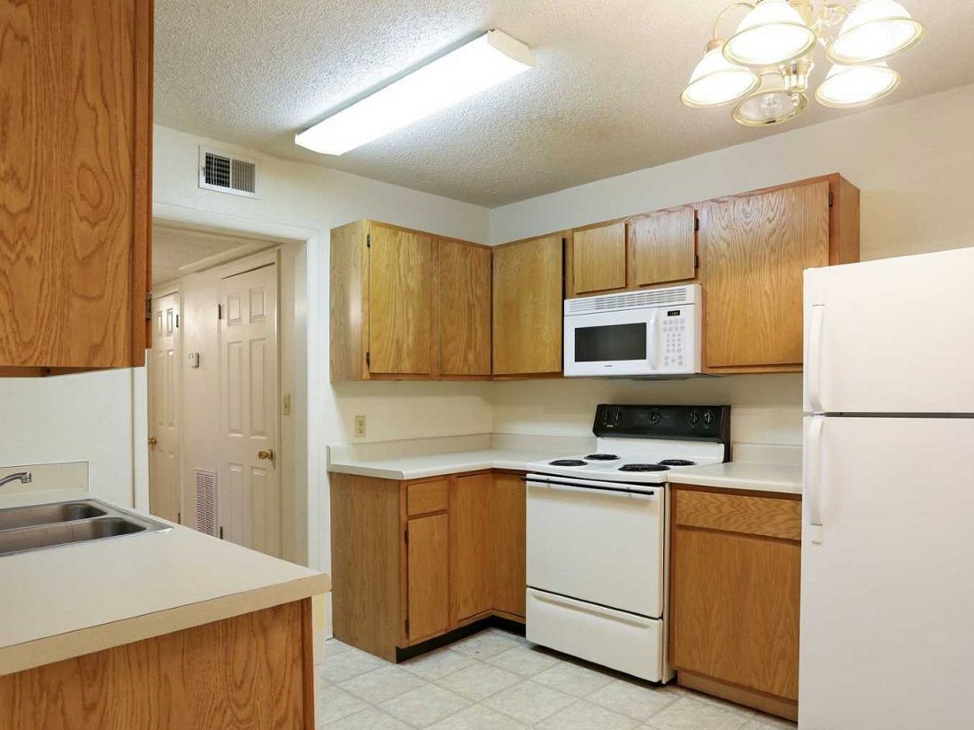 apartment kitchen stove and microwave