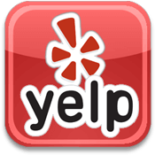 The Yelp logo, featuring the red-and-white asterisk-like star icon above the word 