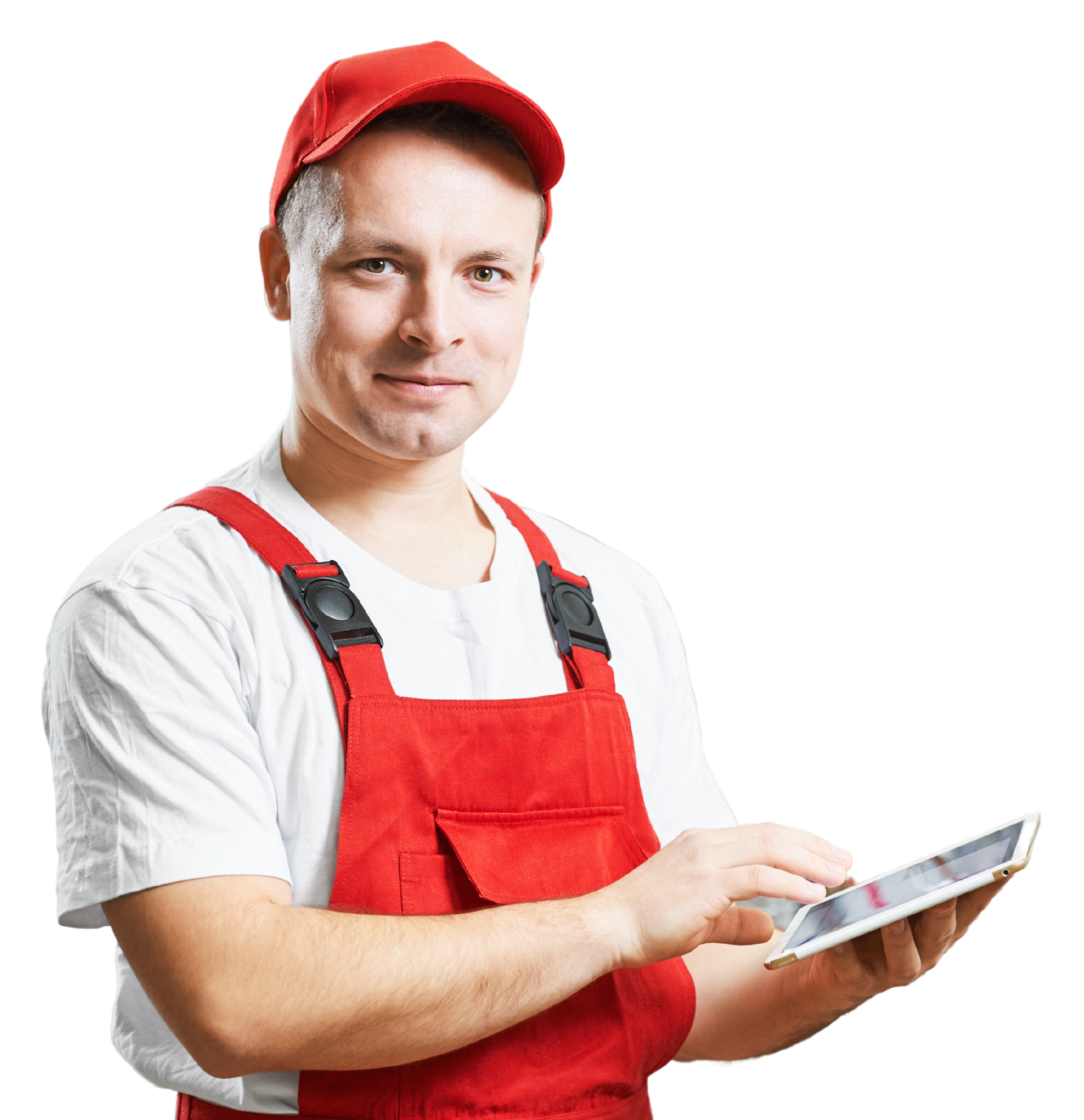 A man in red overalls is using a tablet