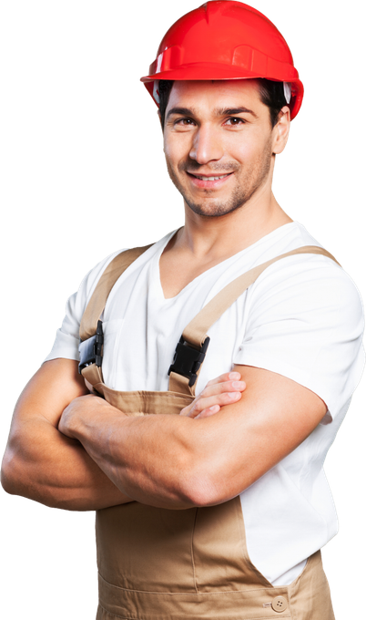 A man wearing a hard hat and overalls is standing with his arms crossed.