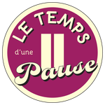 Un cercle violet avec les mots le temps d'une pause dessus