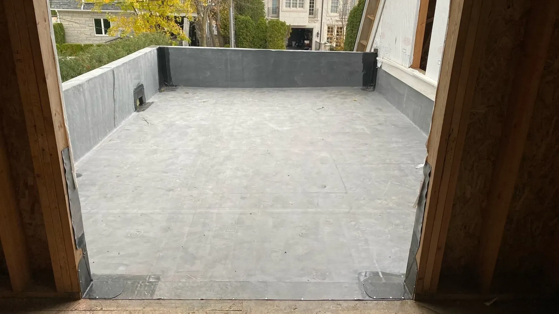 There is a large concrete area in the middle of a building.