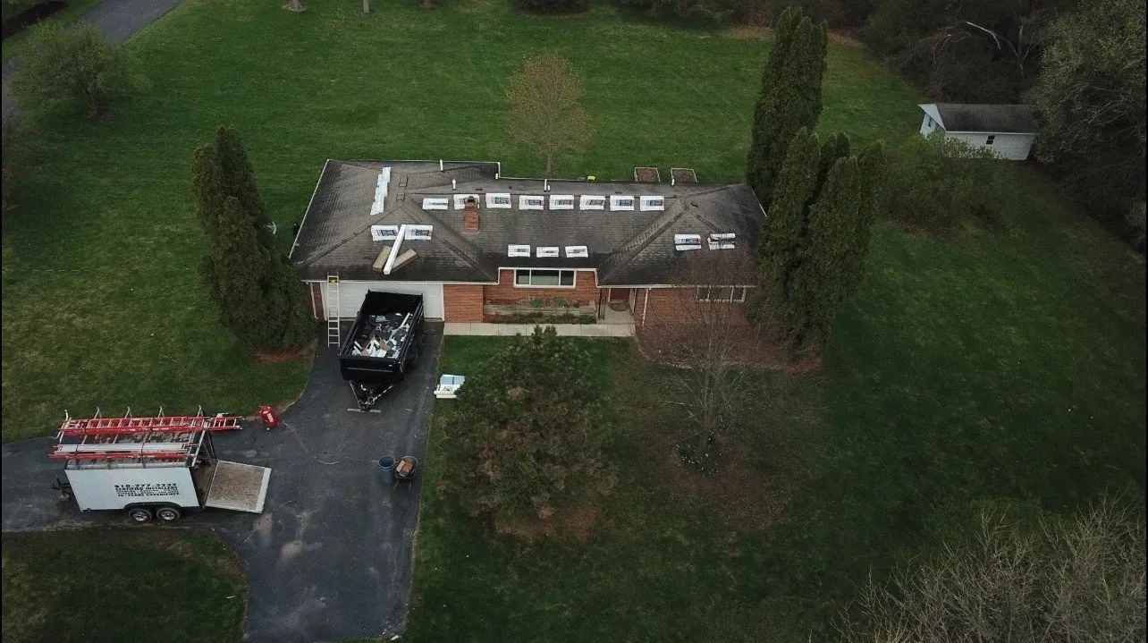 An aerial view of a house with the word free written on the roof