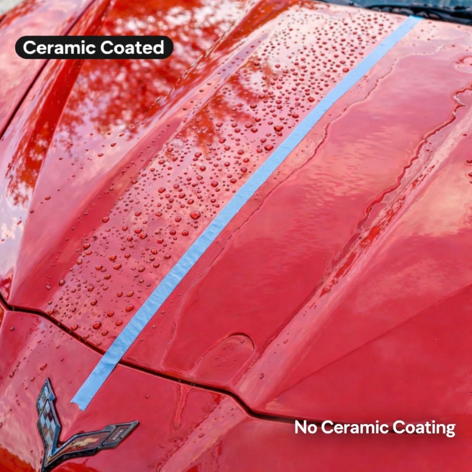 Red car hood showing water beading on the ceramic coated side and spreading on the uncoated side.