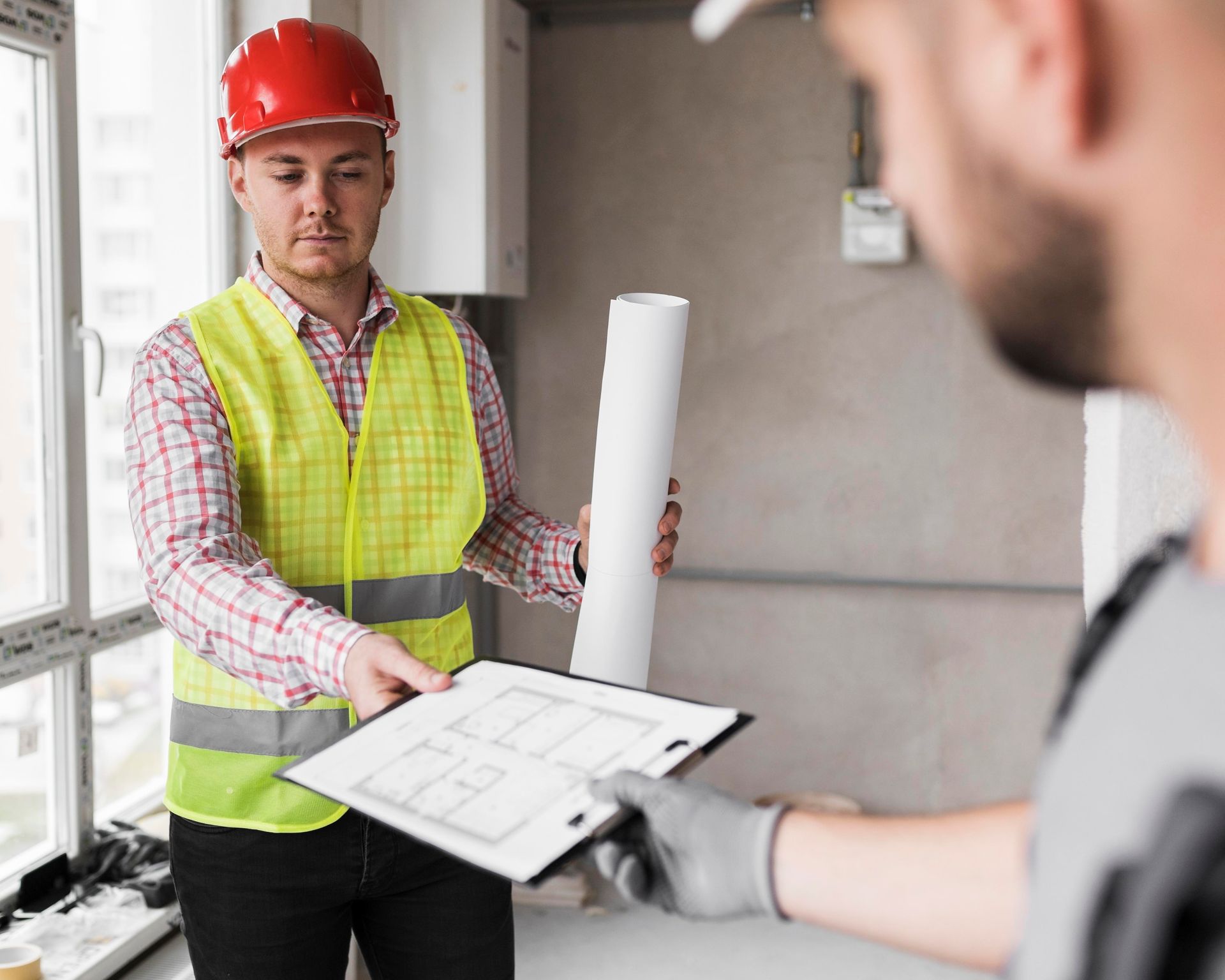 Commercial surveying service worker handing piece of paper