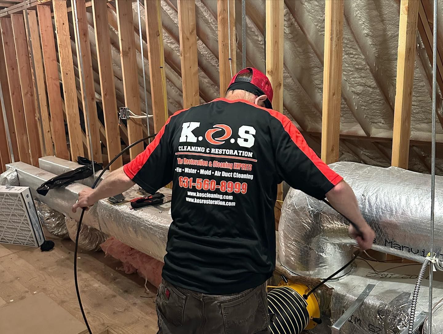 KOS cleaning air ducts at a home on Long Island. 
