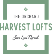 Logo: The Orchard Harvest Lofts, San Luis Ranch, with green square frame and text.