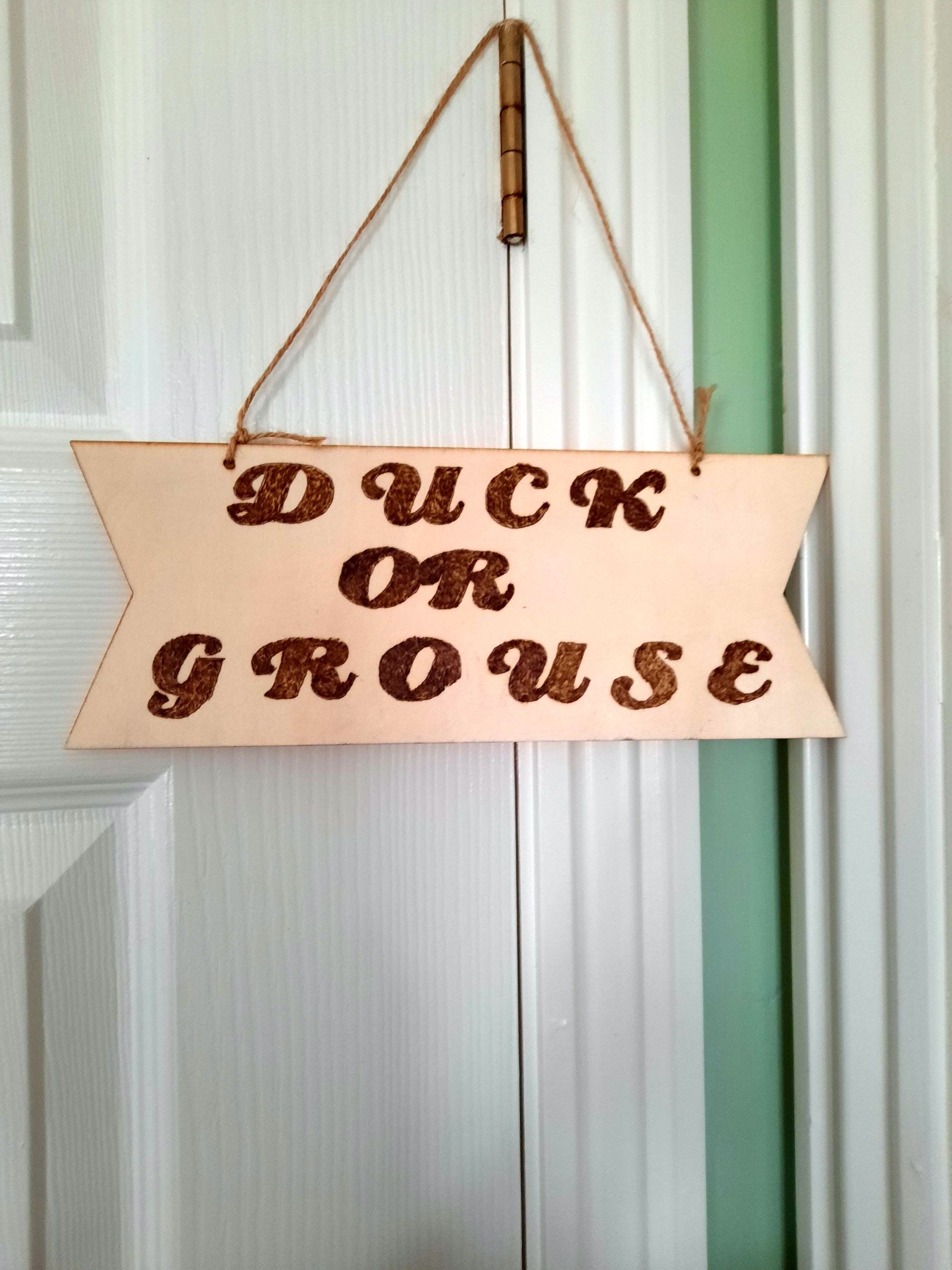 Duck or Grouse sign - to put on low ceilings as head height warning
