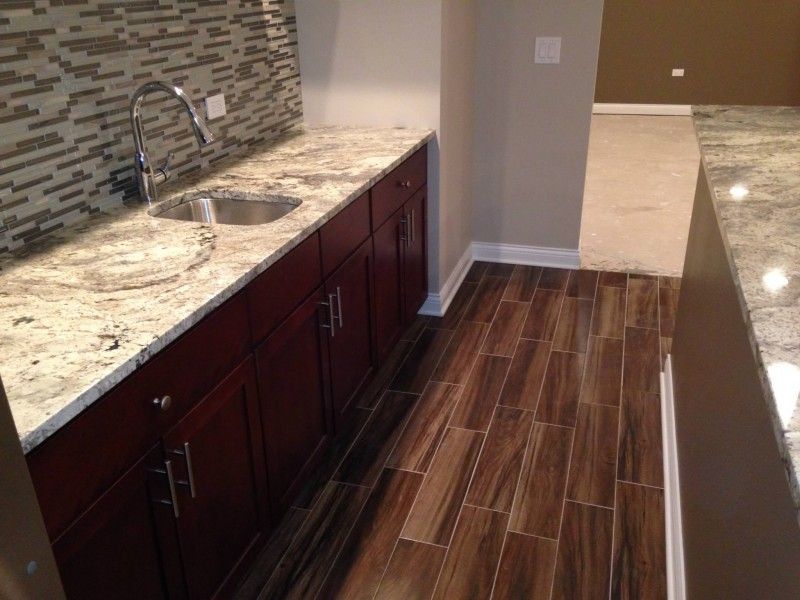 A kitchen with granite counter tops and a sink