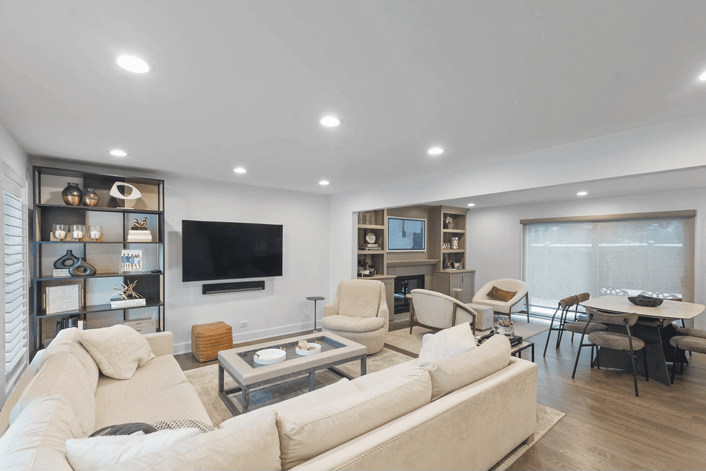 A living room filled with furniture and a flat screen tv.